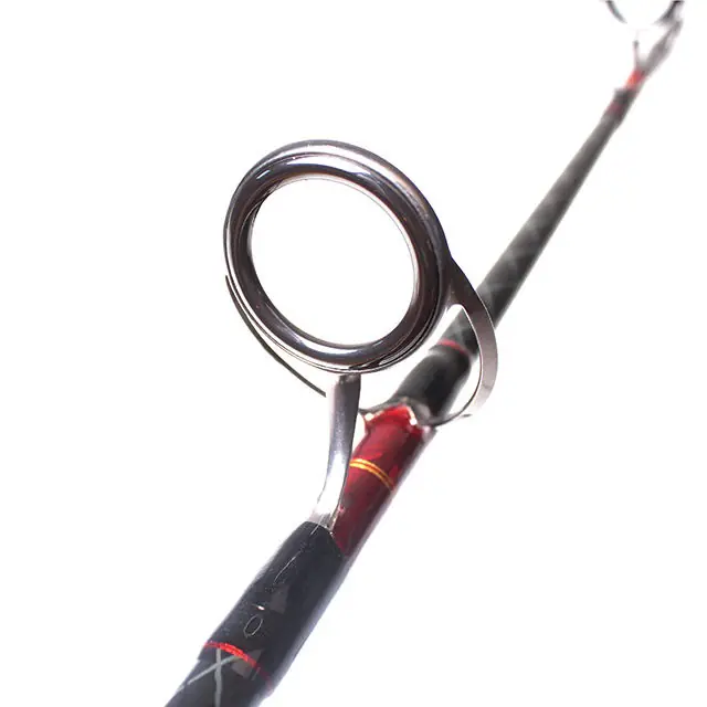 4-black-carbon-jigging-rod-metal-guide-ring-closeup.jpg Black carbon jigging rod metal guide ring close-up