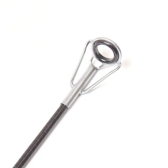 4-telescopic-surf-rod-tip-top-guide-closeup.jpg Telescopic surf rod tip top guide close-up white background