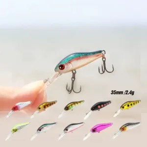 Micro deep diving minnow lure 35mm 2.4g shown in fingers with multiple color options