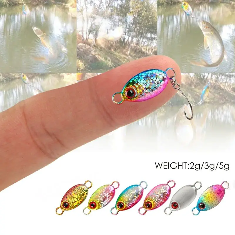 Person holding a colorful micro metal spoon fishing lure on a fingertip with caught fish background and color variations below.
